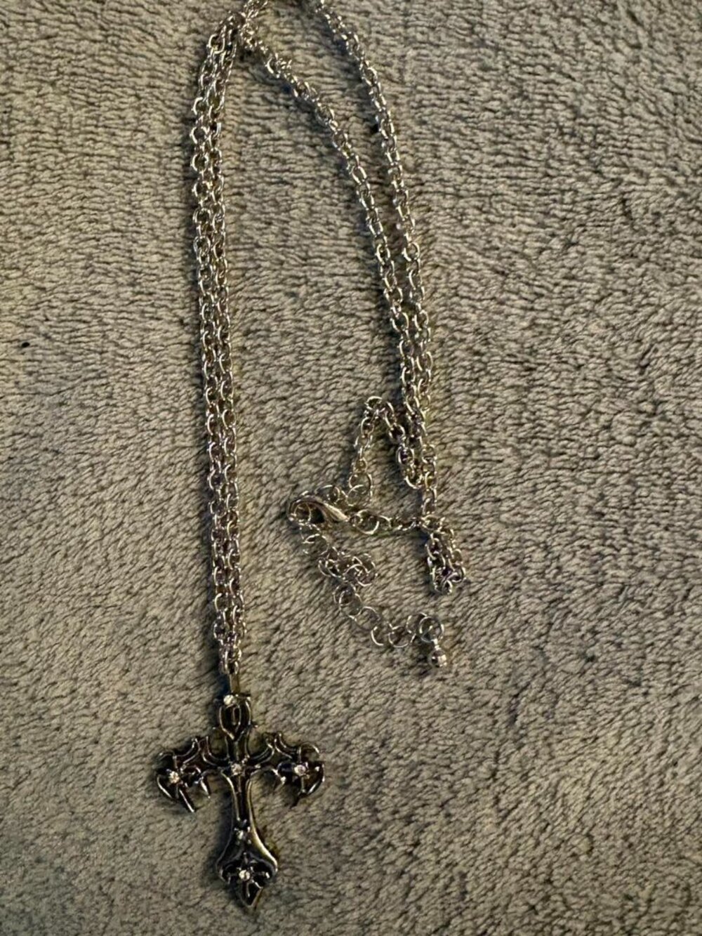 stylized silver skater cross
